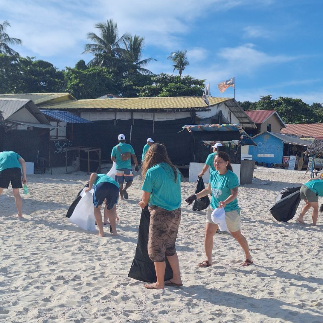 Guests, locals and staff gathering side by side